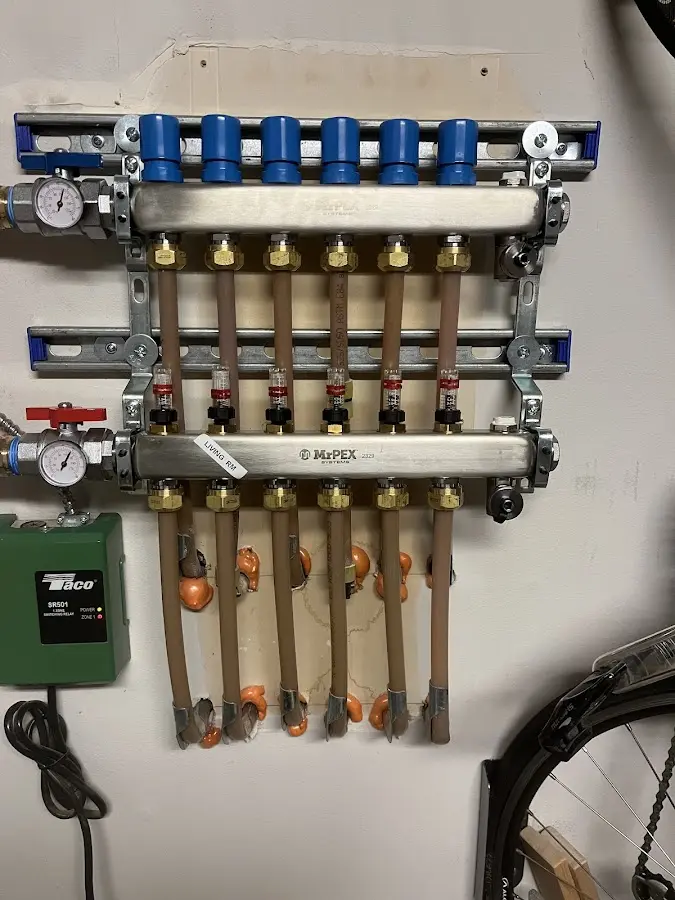 Plumber performing Gas Leak Detection at a residential property in Randolph Town